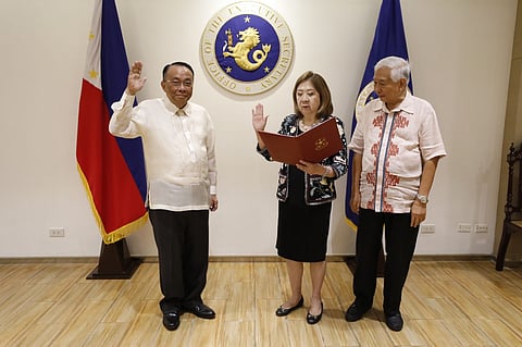 EXECUTIVE Secretary Lucas Bersamin administers the oath of office of Ombudsman to Justice Mariflor Punzalan-Castillo who will serve as the department's Officer-in-Charge following the the retirement of Samuel Martires on Sunday, 27 July.