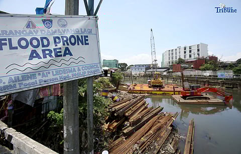  Steel sheet piles are seen at an ongoing Department of Public Works and Highways (DPWH) flood control project along the flood-prone San Juan River in Barangay Damayang Lagi, Quezon City. The construction activity comes a day after President Ferdinand Marcos Jr., in his fourth State of the Nation Address, ordered a review of all government flood control projects and a crackdown on corrupt officials linked to anomalies. 