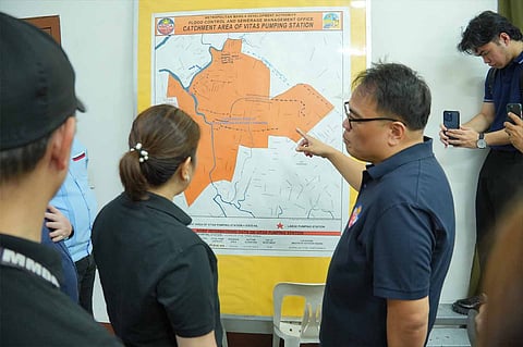 MMDA Chairman Romando Artes and DBM Secretary Amenah Pangandan assess the Integrated Solid Waste Management Facility (ISWMF) at Vitas Pumping Station. 