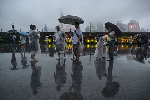 Shanghai evacuates 283,000 people as typhoon nears