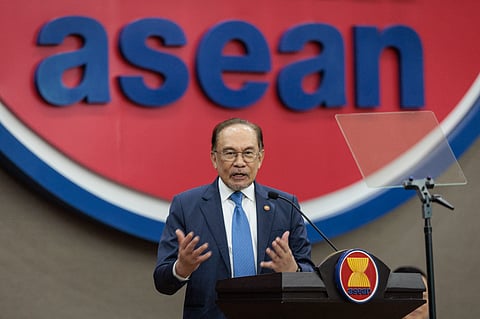 Malaysia's Prime Minister Anwar Ibrahim delivers a speech at the Association of Southeast Asian Nations (ASEAN) Secretariat in Jakarta on July 29, 2025.
