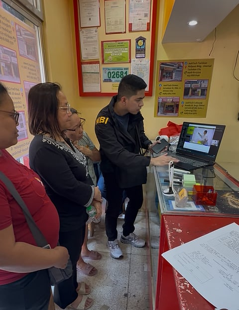 NBI agents entrapped a man selling pirated bar exam reviewer inside a computer repair shop in Tacloban City. Photo courtesy NBI, paki blur po face salamat