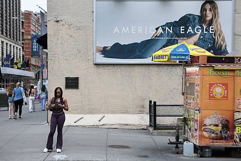 A billboard of actress Sydney Sweeney is seen outside of an American Eagle store on August 01, 2025 in New York City. American Eagle’s recent denim ad campaign featuring Sweeney has drawn backlash for language and imagery that critics say echoes eugenics-era rhetoric, following a tagline referencing “great genes” alongside visuals of Sweeney in blue jeans.