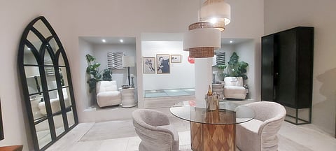 Banksy’s ‘Love in the Air’ peeking through the gallery.