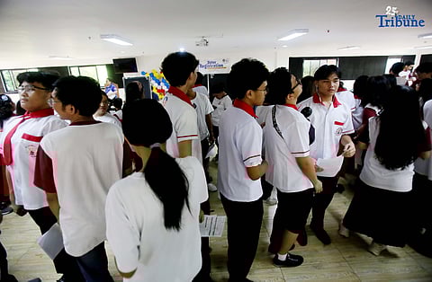 (August 01 2025) San Juan City Science High school students queuing to register for the Barangay, Sangguniang Kabataan Elections (BSKE) during the first day of resumption of the Commission on Elections (Comelec) voter's registration at the Pinaglabanan Elementary School in San Juan City on Friday August 1 2025. The Comelec resumes voter's registration starting August 1 to 10 and sets up satellite registration sites at various cities to encourage residents to actively participate in the coming BSKE. Photo/Analy Labor
