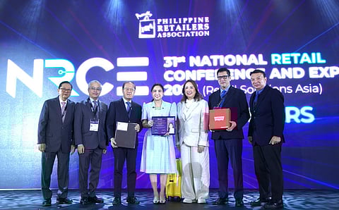 Trade Secretary Cristina A. Roque (4th from left) joins Philippine Retailers Association officials at the 31st National Retail Conference and Expo 2025 at the SMX Convention Center in Pasay on Friday