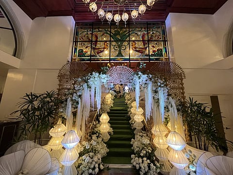 Event entrance adorned with singkaban.