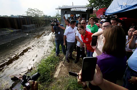 Department of Budget and Management (DBM) Secretary Amenah F. Pangandaman inspects the ongoing P91.4-million flood control project in Brgy. Candating, Arayat, Pampanga, which collapsed on August 17, 2024
