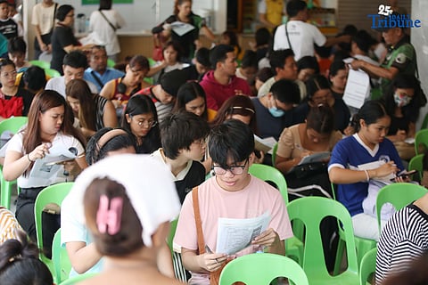 (FILES) Residents queue at the satellite voters' registration at the Barangay Commonwealth in Quezon City on Tuesday, August 5, 2025, for the upcoming Barangay, Sangguniang Kabataan Elections (BSKE). Photo/Analy Labor

