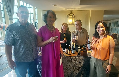 Palaweño Brewery representatives with Gemma Cruz-Araneta.