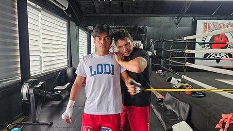 Unbeaten bantamweight Kenneth Llover (left) gets a helping hand from top strength coach Alex Ariza as he battles Panamanian Luis Concepcion next week.