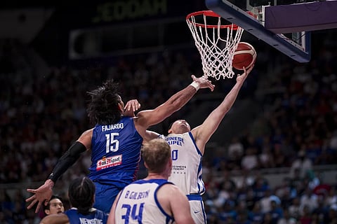 JUNE Mar Fajardo struggles during Gilas Pilipinas’ 87-95 loss to Chinese Taipei in the opening salvo of the 33rd FIBA Asia Cup on Wednesday in Jeddah.