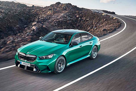 ELECTRIFIED but still fierce, the 2026 BMW M5 charges through curves with V8 power and EV silence.