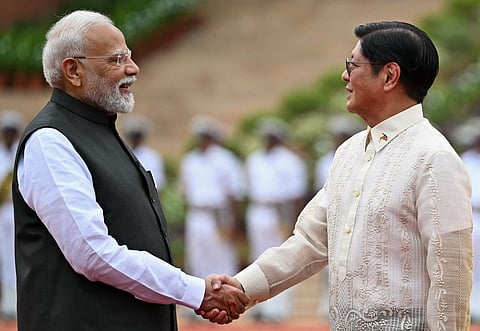 PHILIPPINE President Ferdinand Marcos (right) shakes hands with India’s Prime Minister Narendra Modi during a ceremonial reception at Rashtrapati Bhavan, India’s presidential palace in New Delhi, on 5 August.