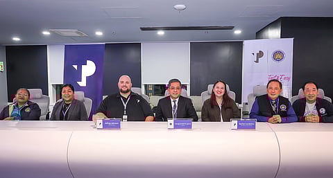 CHIEF People Officer of TP in the Philippines Jeffrey Johnson (third from left) and Vice President of Human Resources Rachel Cacabelos (fifth from left)