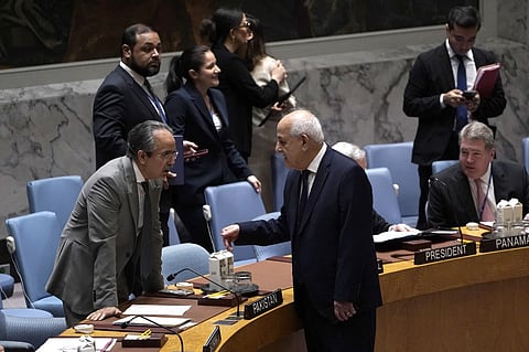Riyad Mansour (R), Palestinian Ambassador to the UN, speaks with Pakistan's Ambassador to the UN Asim Iftikhar Ahmad (L) during an emergency UN Security Council meeting on the situation in Gaza at United Nations headquarters on August 10, 2025 in New York. A UN official on Sunday warned the Security Council that Israel's plans to control Gaza City risked "another calamity" with far-reaching consequences as Benjamin Netanyahu insisted his goal was not to occupy the territory. The UN Security Council held a rare emergency weekend meeting after Israel said its military would "take control" of Gaza City approved by Prime Minister Netanyahu's security cabinet that sparked a wave of global criticism. "If these plans are implemented, they will likely trigger another calamity in Gaza, reverberating across the region and causing further forced displacement, killings, and destruction," UN Assistant Secretary Miroslav Jenca told the UNSC.

