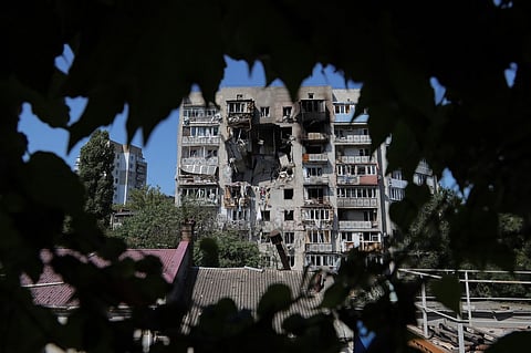 This photograph taken on July 24, 2025 shows a damaged residential building following a drone attack in Odesa, amid the Russian invasion in Ukraine.
