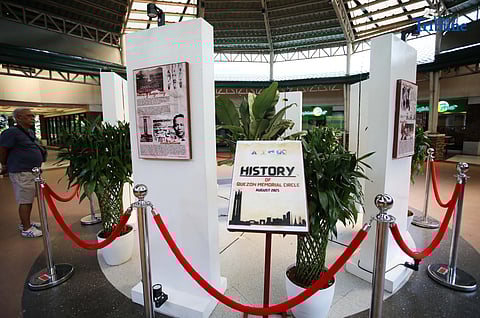 In the lead-up to Manuel L. Quezon Day on August 19, a man views a historical photo display at Quezon Memorial Circle in Quezon City. Quezon, born August 19, 1878, in Baler, was a Filipino statesman, leader of the independence movement, and the first president of the Philippine Commonwealth established in 1935 under U.S. tutelage. 