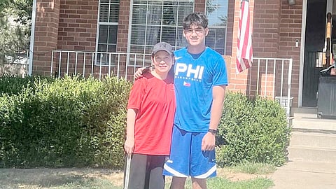 KIEFFER Alas (right) has formally settled in his new home in Utah where he will play and study at Layton Christian Academy. Joining him is his mother, Liza. 