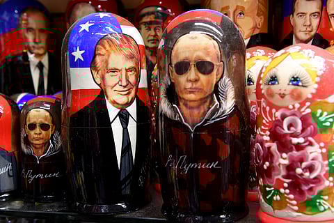Matryoshka dolls depicting Russia’s President Vladimir Putin and US President Donald Trump are displayed for sale in Saint Petersburg. The Kremlin said that a milestone summit between Donald Trump and Vladimir Putin to resolve the conflict in Ukraine was set for the ‘coming days.’