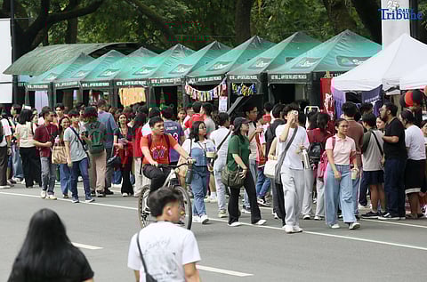 On the second day of school, students visit different orgs at the University of the Philippine Freshie Month Org Fair in front of the Palma Hall inside the UP Diliman Campus in Quezon City on Tuesday, 12  2025. 
