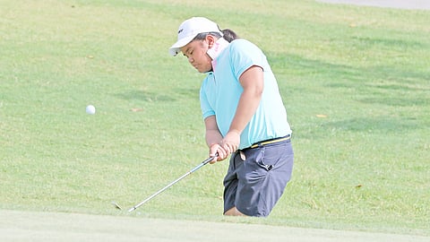 RONEE Dungca chips onto the green during the final round of the ICTSI Pradera Verde Championships in Lubao, Pampanga on Wednesday.