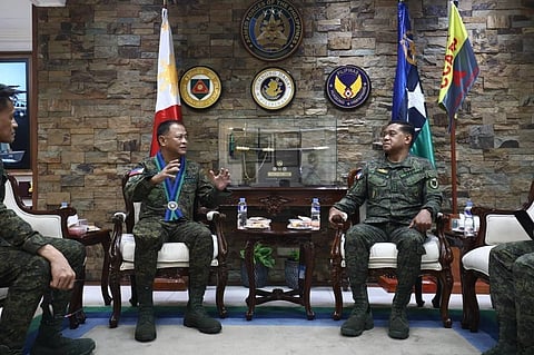 ⁨The Commanding General, Philippine Army (CGPA) Lt. Gen. Antonio G. Nafarrete troops the line during the arrival honors in connection with his courtesy call on the Armed Forces of the Philippines Chief of Staff (CSAFP) Gen. Romeo S. Brawner at Camp General Emilio Aguinaldo, Quezon City. (Photo by by SSg. Cesar P. Lopez I PA/OCPA)