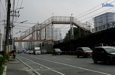 The controversial Mount Kamuning footbridge along EDSA is seen on Thursday, Aug. 14, 2025. The Department of Transportation (DOTr) announced a new footbridge project starting today to replace the existing structure near EDSA-Kamuning. The new bridge is designed to provide a safer and more accessible crossing for commuters, replacing the so-called “Mt. Kamuning” footbridge.
