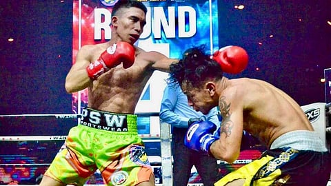 Filipino contender Jayson Vayson (left) hopes to bring his punching prowess — seen here against Indian Shanborlang Marbaniang — when he battles Puerto Rican star Oscar Collazo next month in the United States.