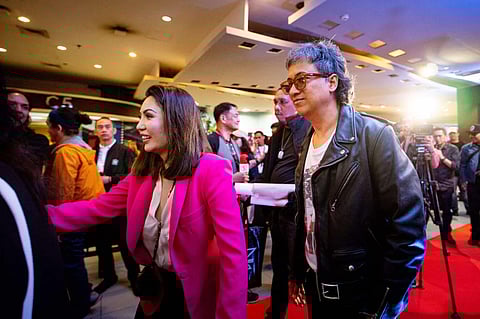Filmmaker and producer Maria Diane Ventura and Eraserheads vocalist Ely Buendia.