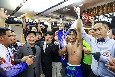 Kenneth Llover celebrates his eighth-round stoppage win over Panamanian Luis Concepcion with his promoters Gerry Peñalosa and Japanese Koki Kameda on Sunday at Winford Resort Casino.
