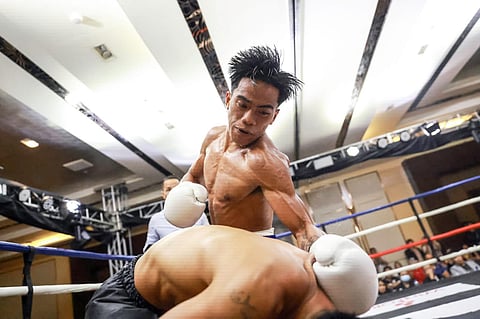 KENNETH Llover punishes Panamanian rival Luis Concepcion in their bout late Sunday at Winford Resort Casino
