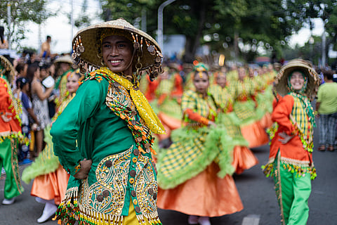 Street dancers from towns and cities across Quezon Province perform in colorful costumes during the Niyogyugan Festival 2025 Grand Parade in Lucena City on Tuesday, 19 August 2025.