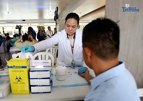 Health workers collect blood samples from Quezon City residents who availed of the free hepatitis screening and counseling at the Ground Floor of the Quezon City Hall High Rise Building on Wednesday, August 20, 2025. The activity was held during the launch of the Hepatitis B and C Model of Care led by the Quezon City Health Department (QCHD) and the Office of the City Mayor (OCM), in partnership with Strengthening the Integrated Treatment and Care for Hepatitis (StITCH), as part of the World Hepatitis Day Celebration 2025.
