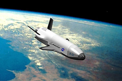 THE  X-37B drone in space. 