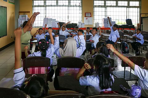 Safer campus Teacher leads an interactive lesson with her pupils at an elementary school in Baseco even as a Cavite college professor stresses the urgent need for consistent policy implementation across the education sector amid rising cases of violence in schools.