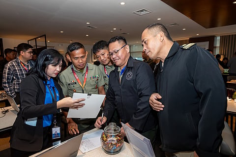 Retiring soldiers join a job fair with Ayala business units at the culmination of the Saludo sa Serbisyo Career Assistance Program. 