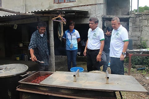 NINDPC Chair Mr. Luis Agaid Jr. (left) demonstrates the process of making natural dyes.