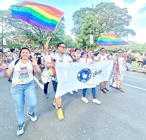 Globe employees at the 2025 Pride PH march at UP-Diliman, Quezon City. 