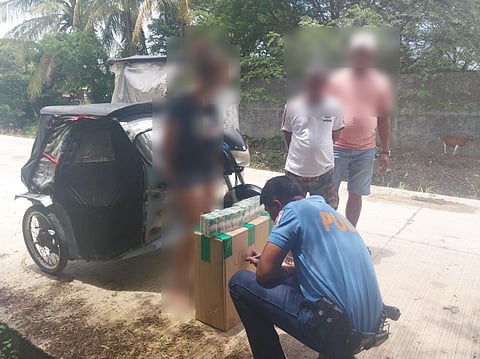 Fake cigarettes were seized while a woman was arrested by the authorities in Barangay San Pascual of this town on the evening of August 25, 2025.
