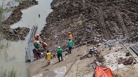 PATCH-UP job Work continues on the fallen slope protection in Malisik River, Barangay Barangca, Candaba, Pampanga, which was destroyed by typhoons in July. The project was completed in November 2024 and cost almost P79 million. The Construction Division of the Department of Public Works and Highways — Pampanga 1st District Engineering Office said the project they are working on a temporary remedy as it is the rainy season. A ‘back to zero’ rehabilitation approach will be undertaken when the time comes.