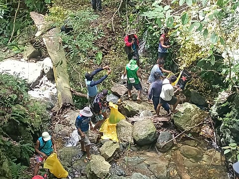 Community volunteers helped in the retrieval of the he remains of a septuagenarian who went missing for a month and was found by a group of boys on August 31, 2025 at Lacub, Abra. 