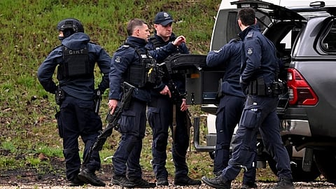 Australian police: Fugitive gunman 
being helped