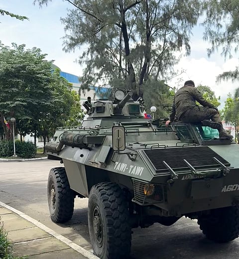 Soldiers have positioned the V-150 vehicle in front of the Bataan Provincial Capitol to secure President Ferdinand Marcos Jr.’s visit Tuesday morning at the 1Bataan Bagong Pilipinas Integrated Action Center. 