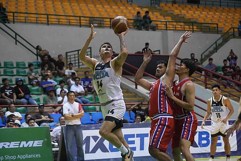 WILL McAloney muscles his way to a 16-point performance to lift Nueva Ecija to a 115-67 win over Sarangani in the MPBL 2025 Season at the Alonte Sports Arena in Biñan, Laguna.