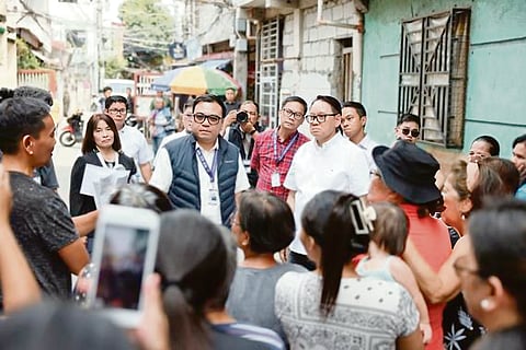To deliver good news among the resident-members of Villa Soledad HOA Inc. in Barangay Pinagbuhatan, Pasig, DHSUD Secretary Jose Ramon Aliling leads the site visit with Social Housing Finance Corporation president and CEO Federico Laxa, informing residents about President Ferdinand R. Marcos Jr.’s desire to assist them in improving their community through the Enhanced Community Mortgage Program (ECMP) under the flagship Expanded Pambansang Pabahay para sa Pilipino (4PH) Program, 13 August,