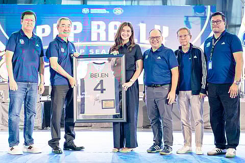 BELLA Belen smiles after National University formally retired her jersey No. 4 during its pep rally on Thursday at the SM Mall of Asia Music Hall. Also shown are NU Lady Bulldogs team manager Engr. Engineer Bing Diet, NU chairman Dr. Hans Sy, NU president Dr. Renato Carlos Ermita, Jr., NU vice chairman Nilo Ocampo and NU athletic director Otie Camangian.