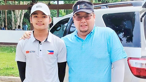 OLIVER Gan (right) poses with 12-year-old Vito Sarines on the eve of the Philippine Amateur Open Championship in Davao City. Little did they know that they will face each other in the quarterfinals. 