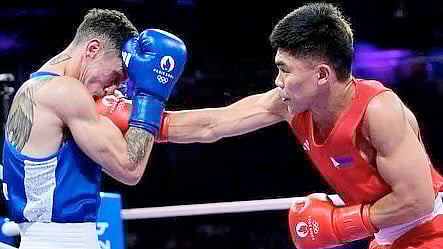 Carlo Paalam survives his debut in the World Championships after beating Taiwanese Hsi Chao Chunnin their men’s 55-kilogram Round of 64 match in Liverpool, England.