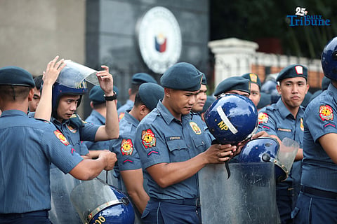 PNP members block the entrance of House of Representatives in Quezon City last 5 September 2025, in preparation for the militant group rally during the DPWH budget hearing.